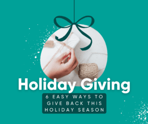Hand tying twine around wrapped gift