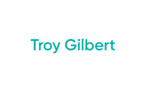 Turquoise Troy Gilbert text on white