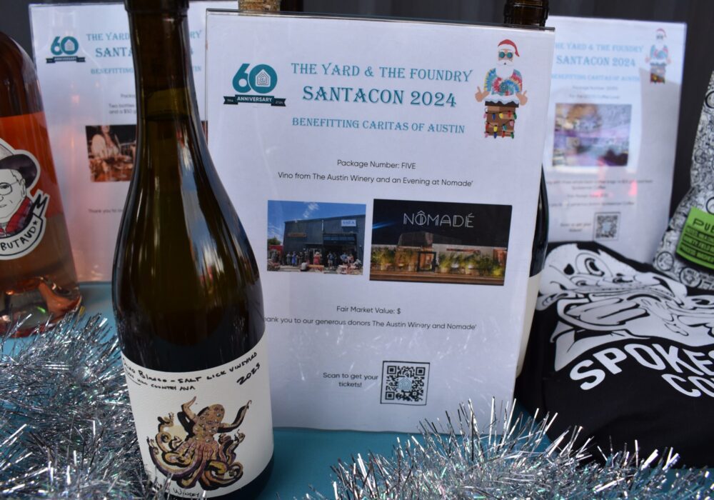 Santacon 2024 charity display with wine bottles