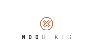 MODBIKES logo with circular stylized emblem